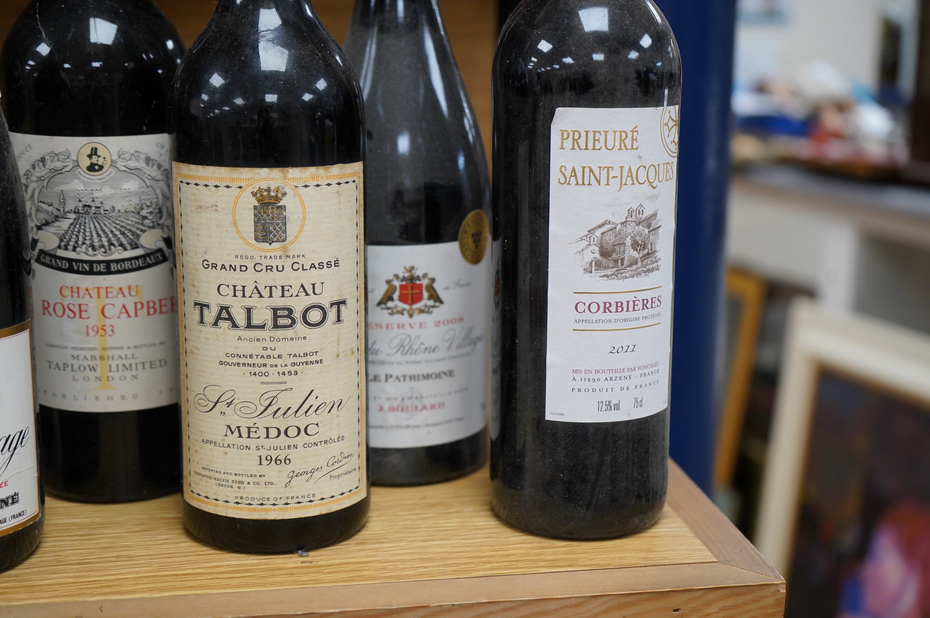 Six bottles of wine comprising two bottles of Chateau Talbot St Julien Medoc grand Cru 1966, one bottle of Chateau La Rose Capbern, Bordeaux 1953, one bottle of Crozes Hermitage vintage 1985, one bottle of Prieure Saint-